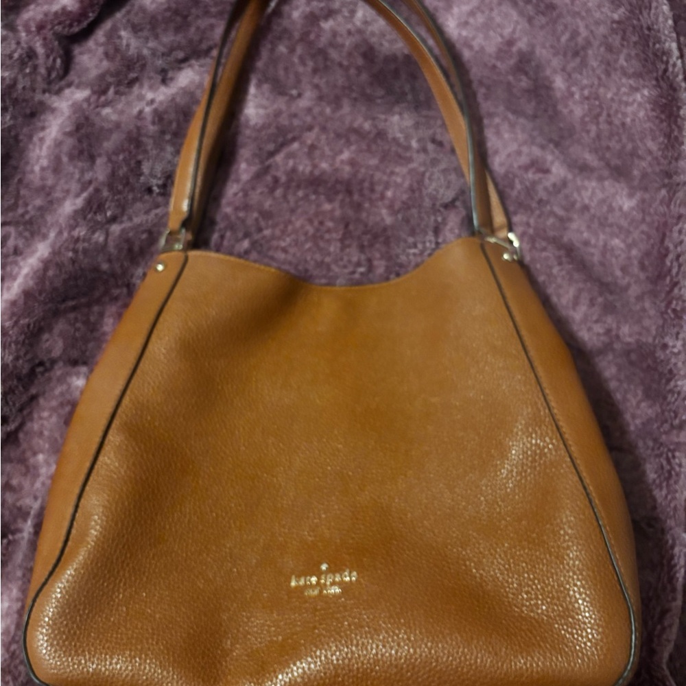 Kate Spade leather brown purse with matching wallet.